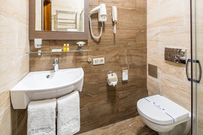 Imagen de la habitación del Hotel Taurus City. Foto 17