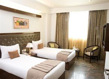 Imagen de la habitación del Hotel Taurus Sarovar Portico. Foto 4