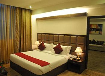 Imagen de la habitación del Hotel Taurus Sarovar Portico. Foto 6