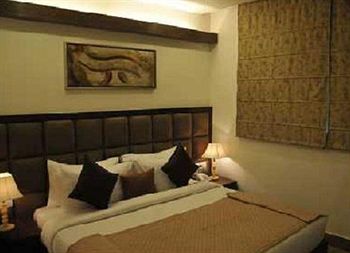 Imagen de la habitación del Hotel Taurus Sarovar Portico. Foto 7