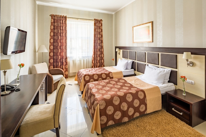 Imagen de la habitación del Hotel Taurus and Spa. Foto 14