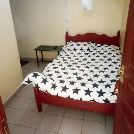 Imagen de la habitación del Hotel Tausi Bar and Lodging. Foto 8