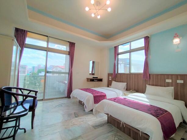 Imagen de la habitación del Hotel Tautauchu. Foto 16