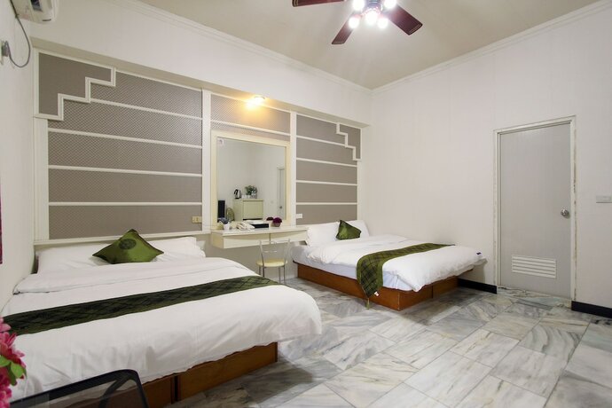 Imagen de la habitación del Hotel Tautauchu. Foto 17