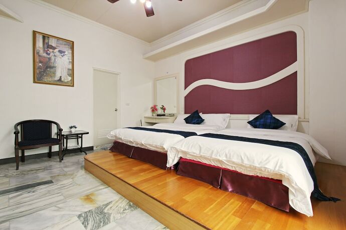 Imagen de la habitación del Hotel Tautauchu. Foto 18