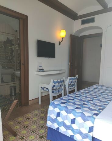 Imagen de la habitación del Hotel Taverna del Capitano. Foto 18