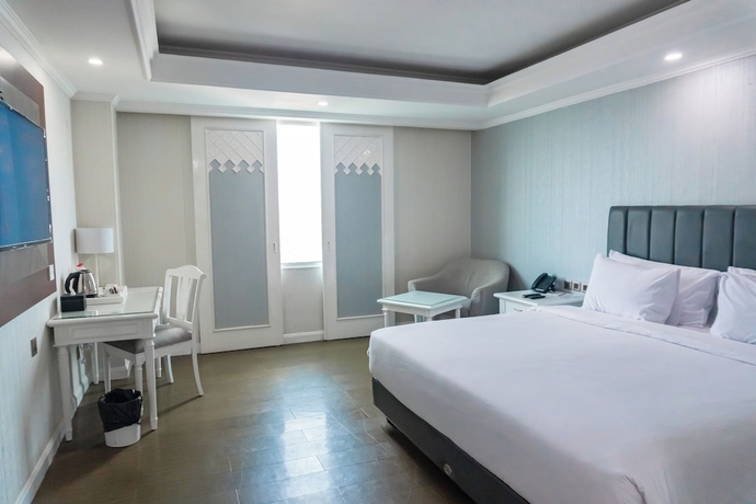 Imagen de la habitación del Hotel Tavia Heritage. Foto 9