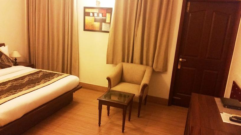 Imagen de la habitación del Hotel Tavisha Villa. Foto 2