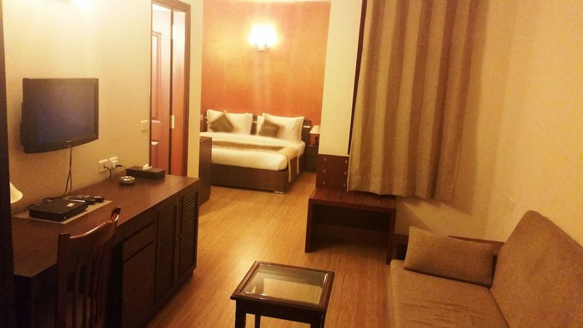 Imagen de la habitación del Hotel Tavisha Villa. Foto 3
