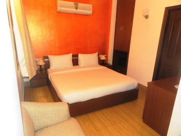 Imagen de la habitación del Hotel Tavisha Villa. Foto 6