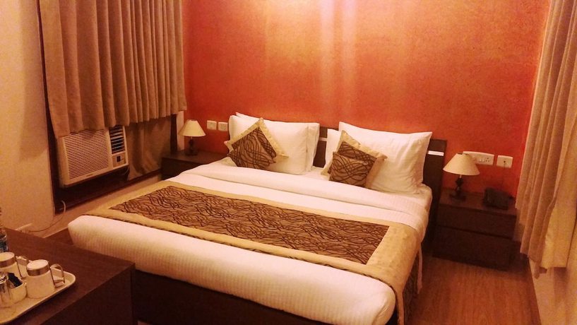 Imagen de la habitación del Hotel Tavisha Villa. Foto 8