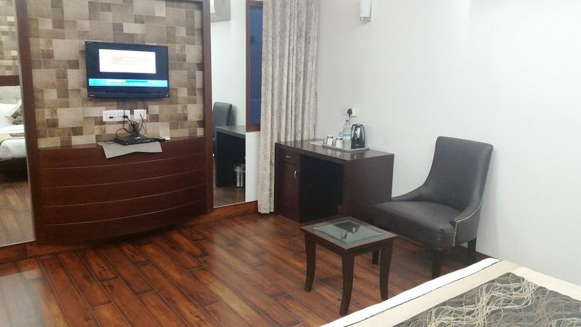 Imagen de la habitación del Hotel Tavisha Villa. Foto 10