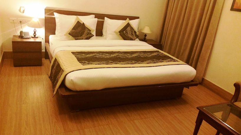 Imagen de la habitación del Hotel Tavisha Villa. Foto 11