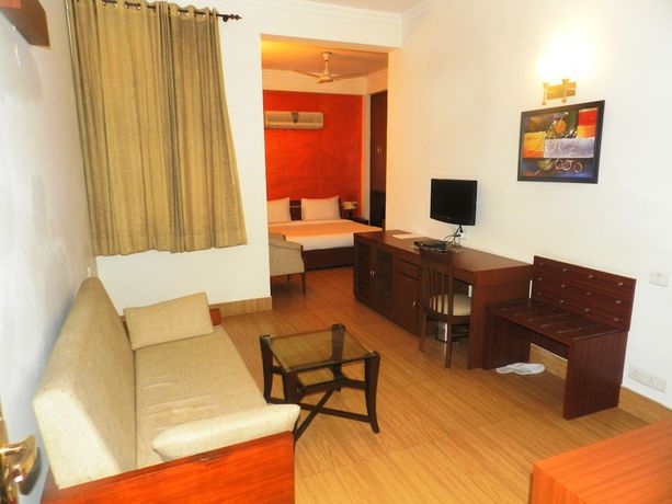 Imagen de la habitación del Hotel Tavisha Villa. Foto 14