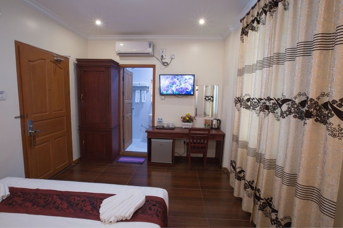 Imagen de la habitación del Hotel Taw Win Myanmar. Foto 11