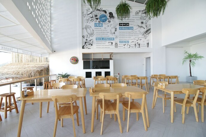 Imagen del bar/restaurante del Hotel Tawaen Beach Resort. Foto 15