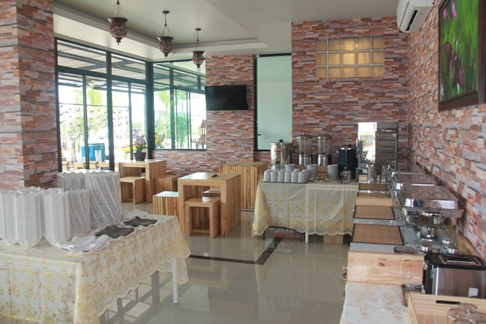Imagen del bar/restaurante del Hotel Tawan Anda Garden. Foto 4