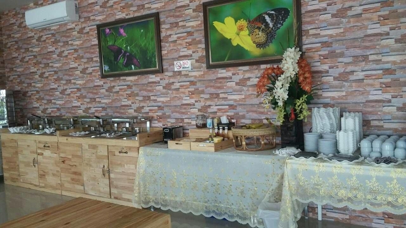 Imagen del bar/restaurante del Hotel Tawan Anda Garden. Foto 5