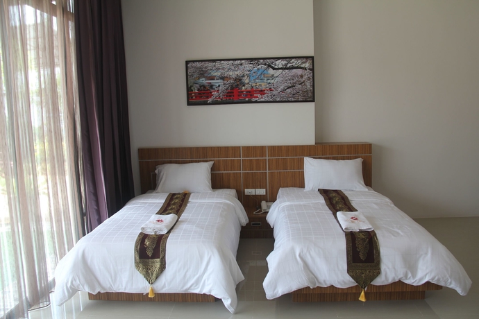 Imagen de la habitación del Hotel Tawan Anda Garden. Foto 10