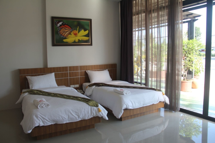 Imagen de la habitación del Hotel Tawan Anda Garden. Foto 13