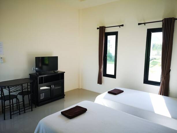 Imagen de la habitación del Hotel Taweesup Resort. Foto 20