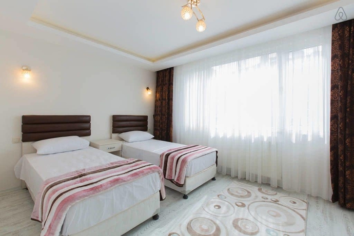 Imagen de la habitación del Hotel Taximum Suites. Foto 2