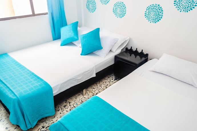 Imagen de la habitación del Hotel Taybo Beach. Foto 13