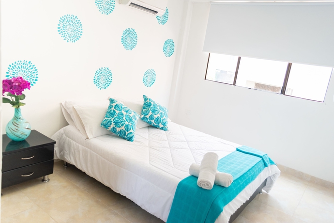 Imagen de la habitación del Hotel Taybo Beach. Foto 17