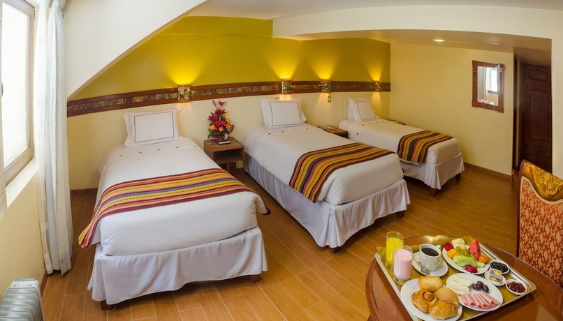 Imagen de la habitación del Hotel Taypikala Cusco. Foto 5