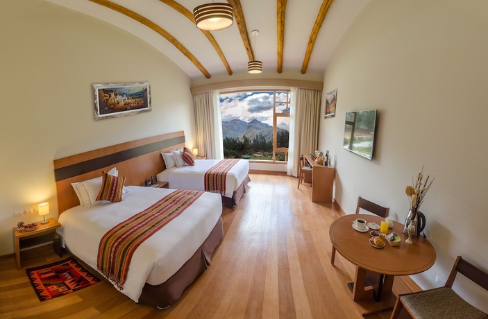 Imagen de la habitación del Hotel Taypikala Deluxe Valle Sagrado. Foto 4