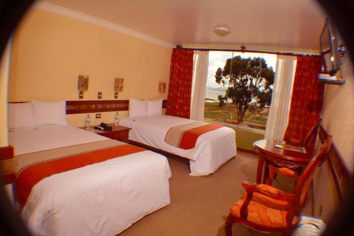Imagen de la habitación del Hotel Taypikala Puno. Foto 2
