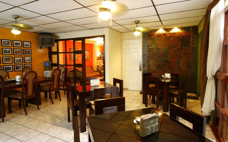 Imagen del bar/restaurante del Hotel Tazumal House. Foto 2
