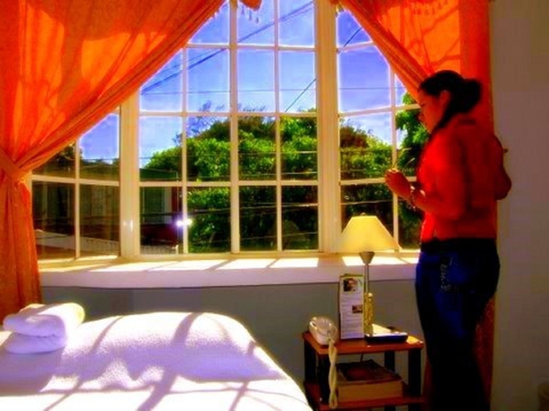 Imagen de la habitación del Hotel Tazumal House. Foto 4