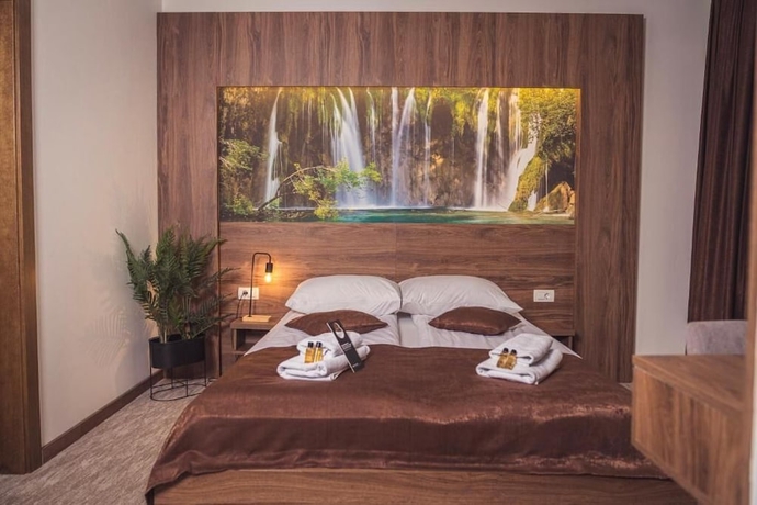Imagen de la habitación del Hotel Tazz- River Front Oasis Collection. Foto 4