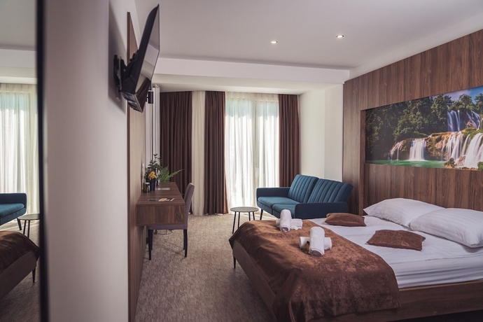 Imagen de la habitación del Hotel Tazz- River Front Oasis Collection. Foto 6