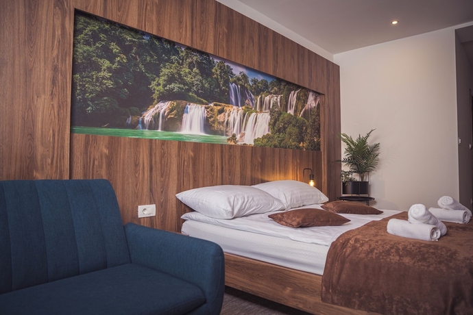 Imagen de la habitación del Hotel Tazz- River Front Oasis Collection. Foto 9