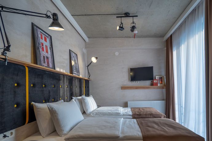Imagen de la habitación del Hotel Tbilisi Story. Foto 2