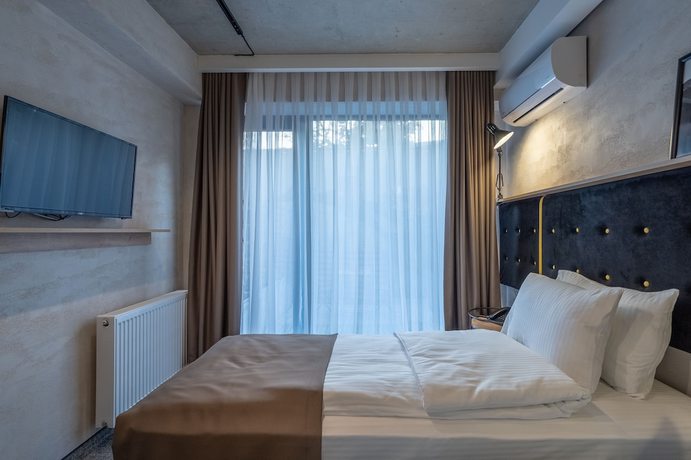 Imagen de la habitación del Hotel Tbilisi Story. Foto 4