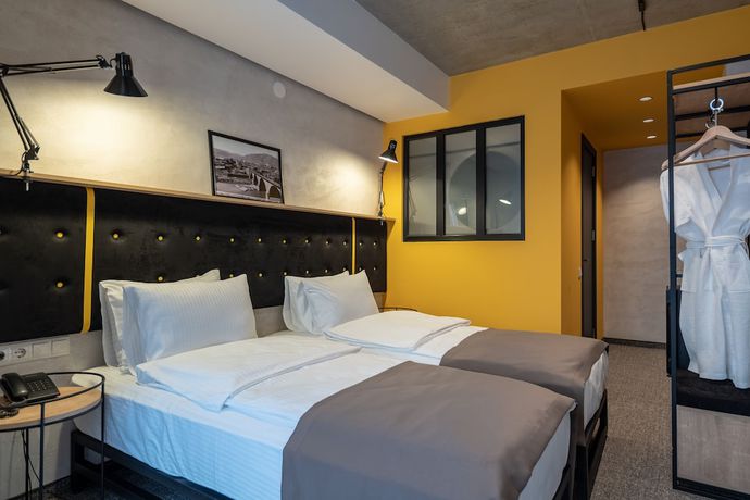 Imagen de la habitación del Hotel Tbilisi Story. Foto 10