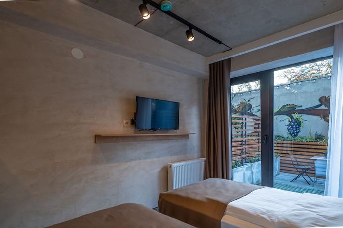Imagen de la habitación del Hotel Tbilisi Story. Foto 18