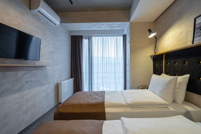 Imagen de la habitación del Hotel Tbilisi Story. Foto 20