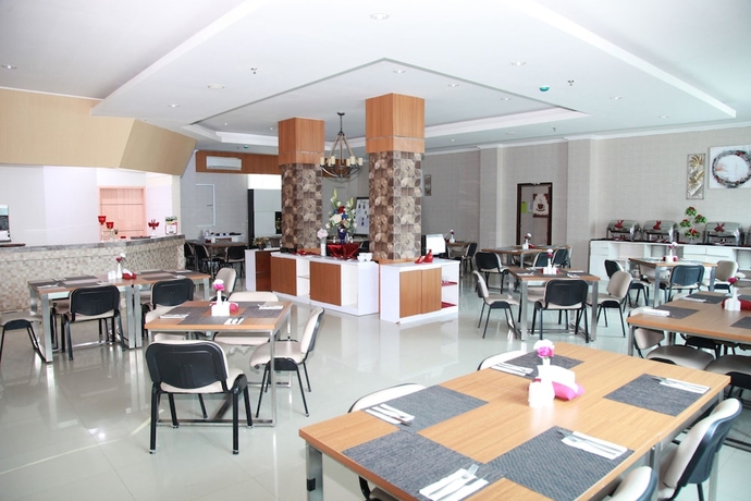 Imagen del bar/restaurante del Hotel Tc Damhil Ung. Foto 5