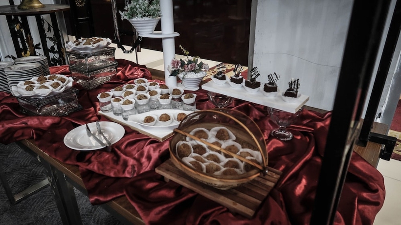 Imagen del bar/restaurante del Hotel Tc Damhil Ung. Foto 6