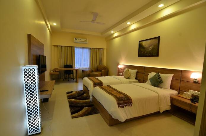 Imagen de la habitación del Hotel Tea County, Dibrugarh. Foto 18