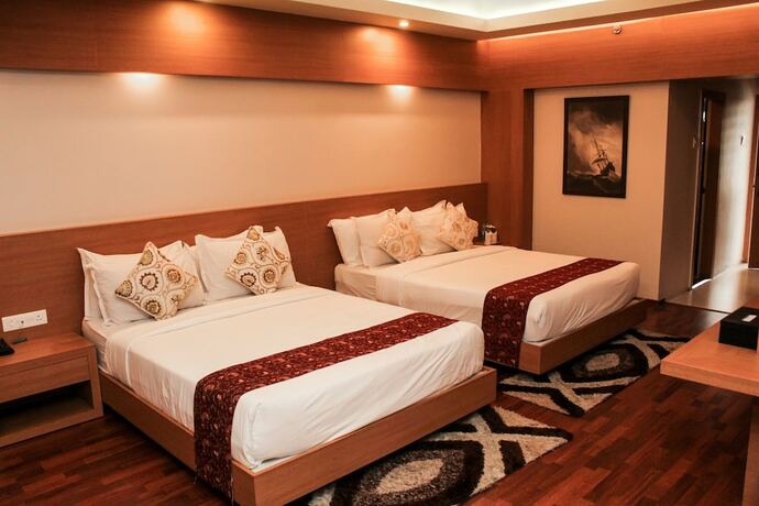 Imagen de la habitación del Hotel Tea County, Dibrugarh. Foto 24
