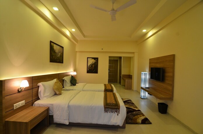 Imagen de la habitación del Hotel Tea County, Dibrugarh. Foto 32