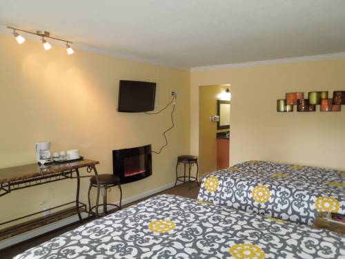 Imagen de la habitación del Hotel Tea Garden Lodge. Foto 3