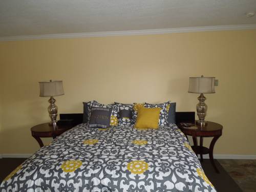 Imagen de la habitación del Hotel Tea Garden Lodge. Foto 6