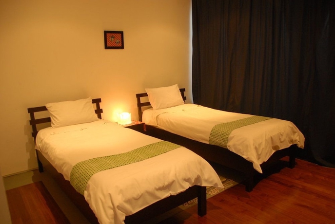 Imagen de la habitación del Hotel Tea Garden Resort. Foto 3