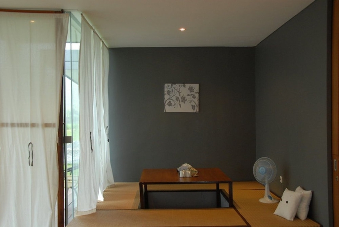 Imagen de la habitación del Hotel Tea Garden Resort. Foto 6